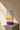 Bred gradient evening vase fra klevering, på travertinsokkel i galleri-stil
