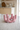 Churros pink lysestage fra klevering, styled på Carrara marmor i køkken