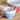 Lively cup with cake and heart