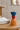 Porcelæn Lysestage med fire farver fra Kersten, på teak mid-century sidebord